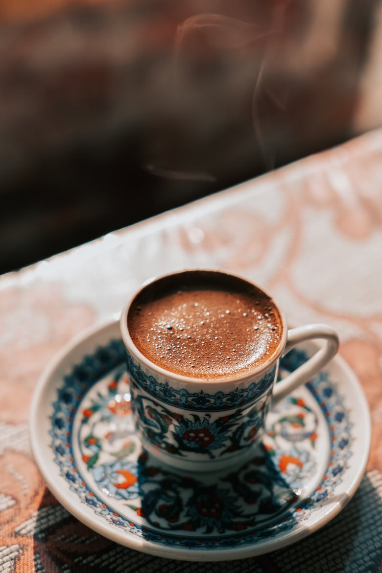 Turkish Coffee in Ceramic Cup on Saucer